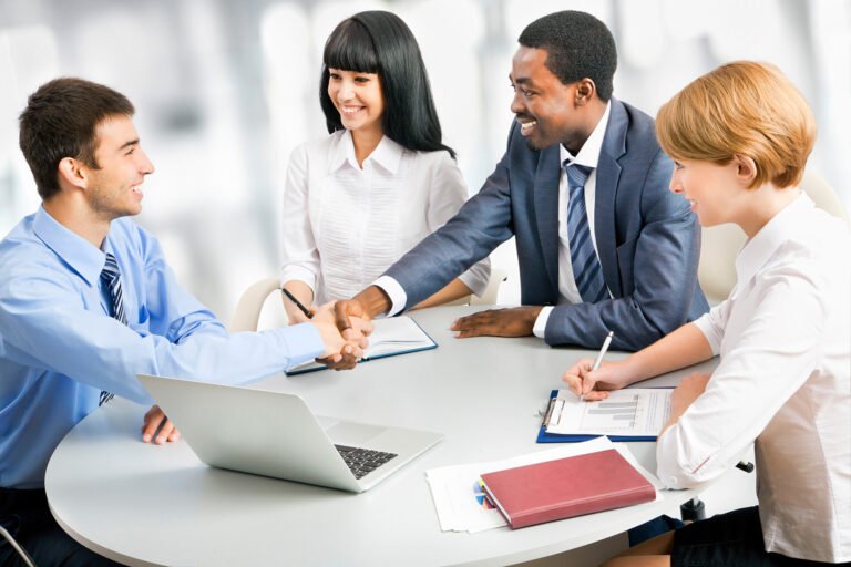 Business people shaking hands, finishing up a meeting